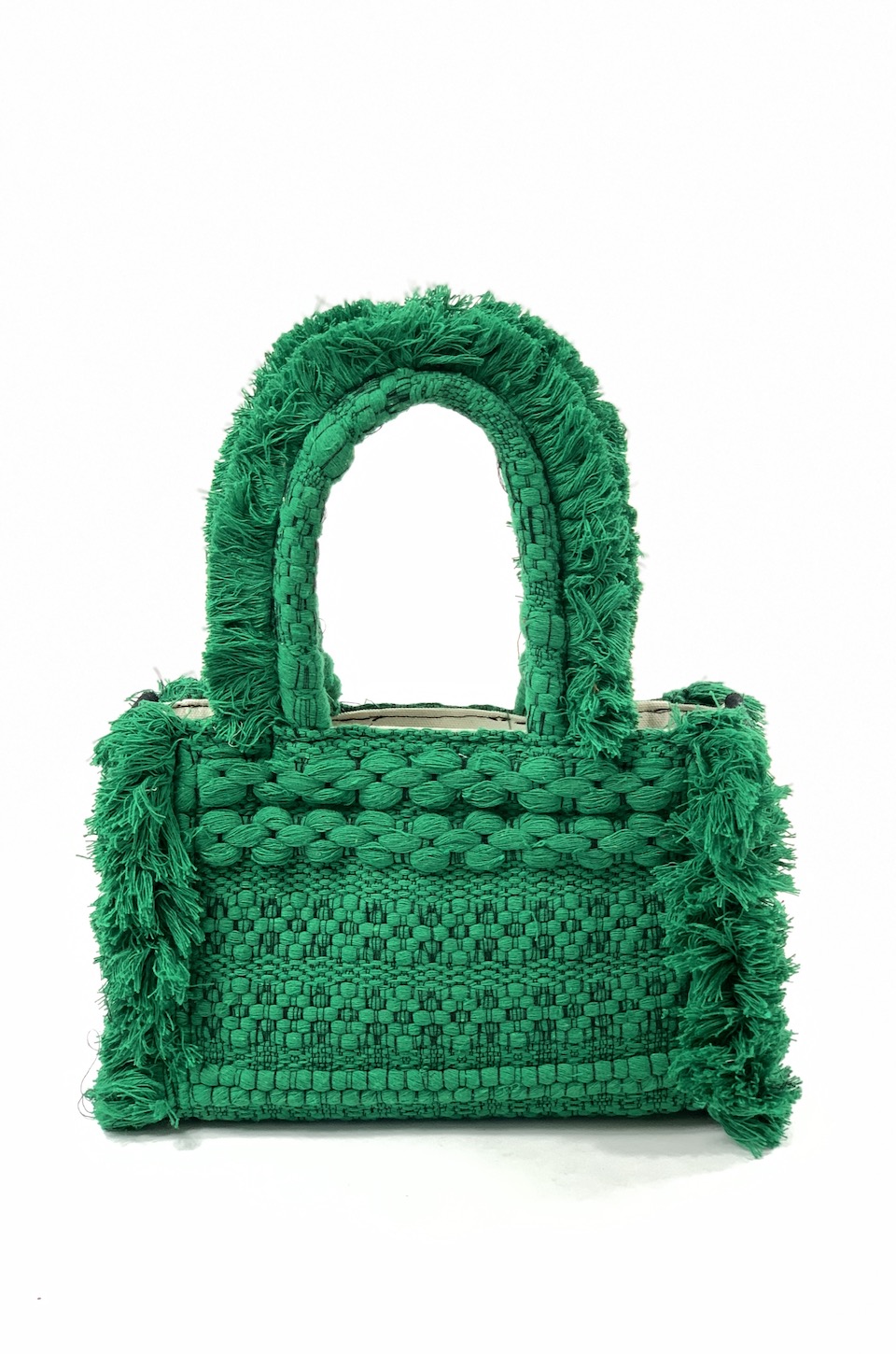 Dark green mini bag handmade of fabrics with short handles and long cross body strap.